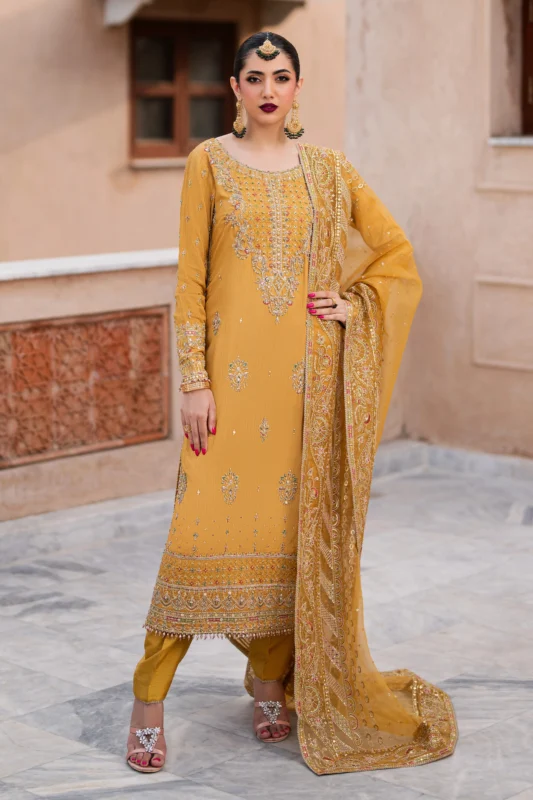 Zilverah mustard raw silk embroidered formal wear for Pakistani women in Norway — front view